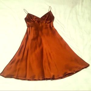 Brown beaded flare slip dress by Carmen Marc Valvo